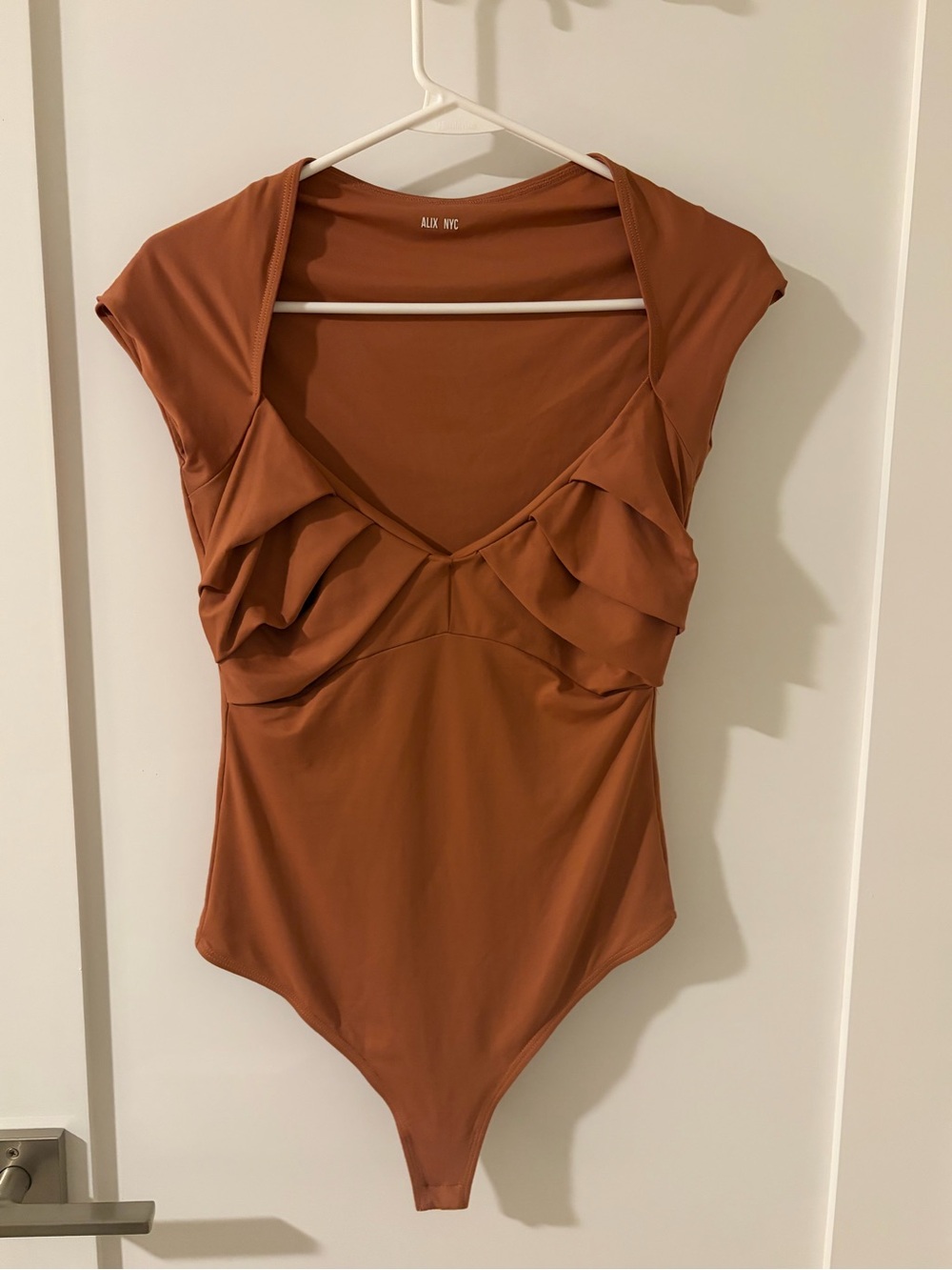 ALIX NYC Rust-Orange Ruffle V-Neck Bodysuit